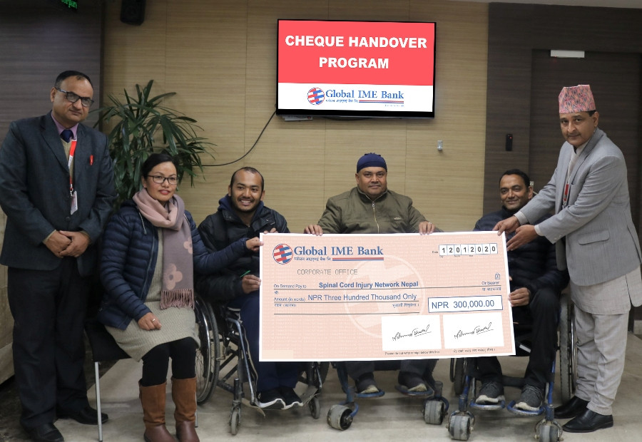 मेरुदण्डीय पक्षघात समूह नेपाललाई ग्लोबल आइएमई बैंकको ३ लाख सहयोग