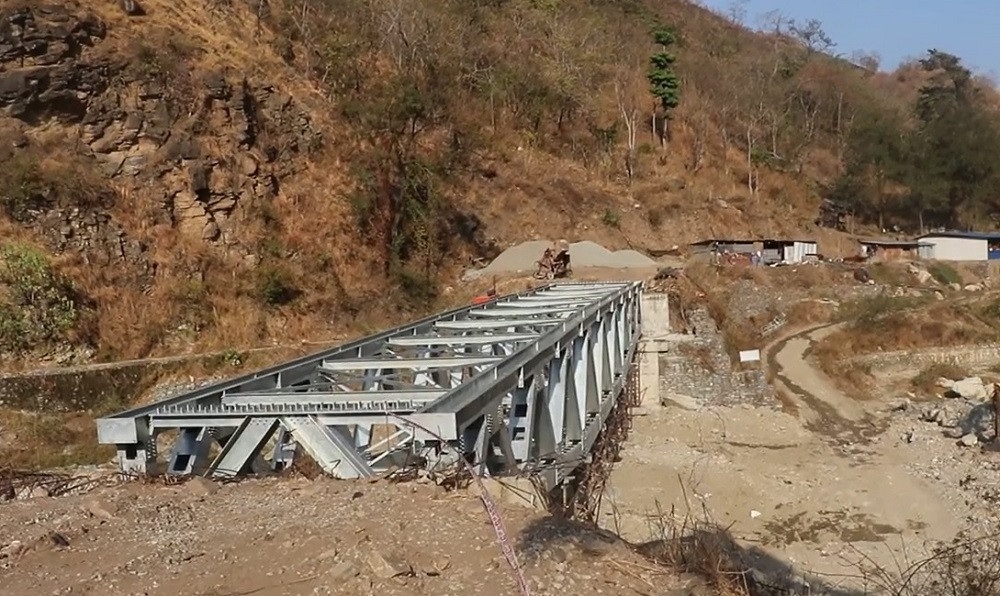 बनिनसक्दै भाँचिएको कावाखोला पुलको पुनःनिर्माण थालियो